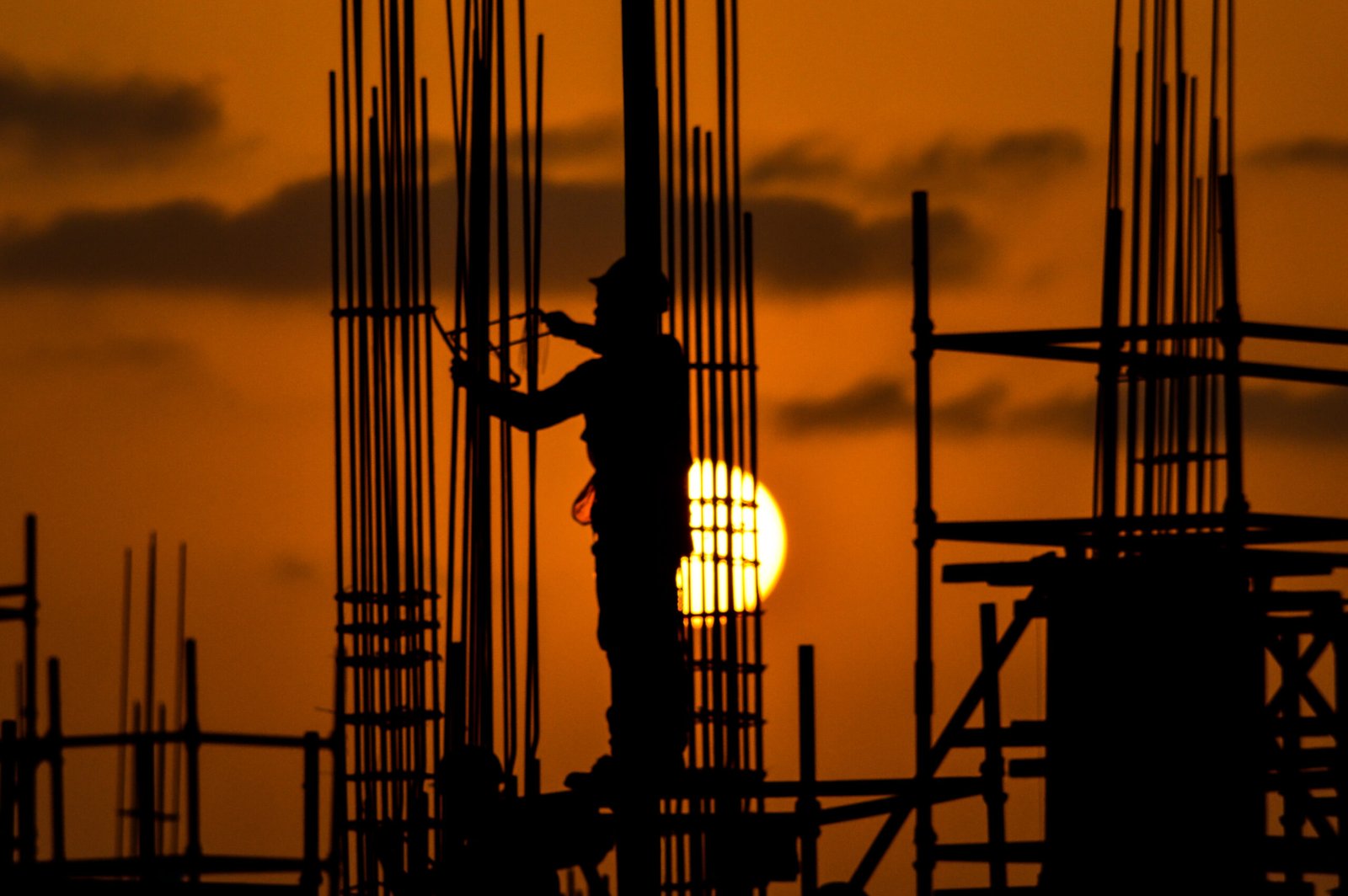 silhouette construction worker sunset silhouette construction worker sunset